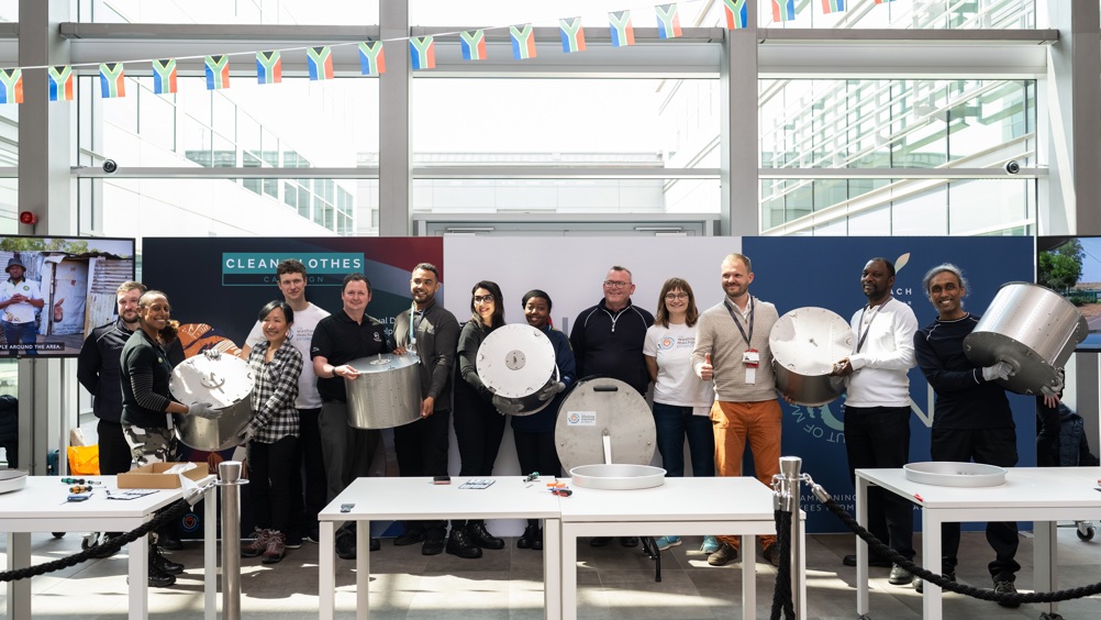 JLR colleagues building Divya washing machines at Gaydon HQ